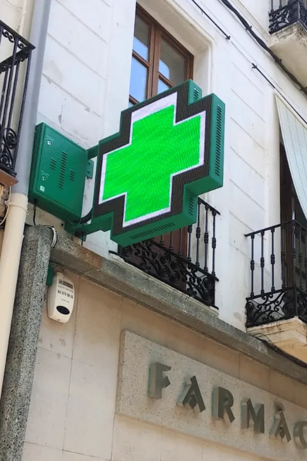 imagen de la cruz de farmacia sirius con animaciones