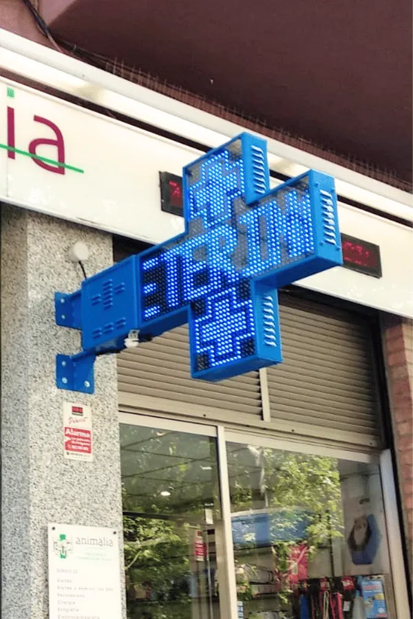 imagen de la cruz venus de veterinaria de color azul