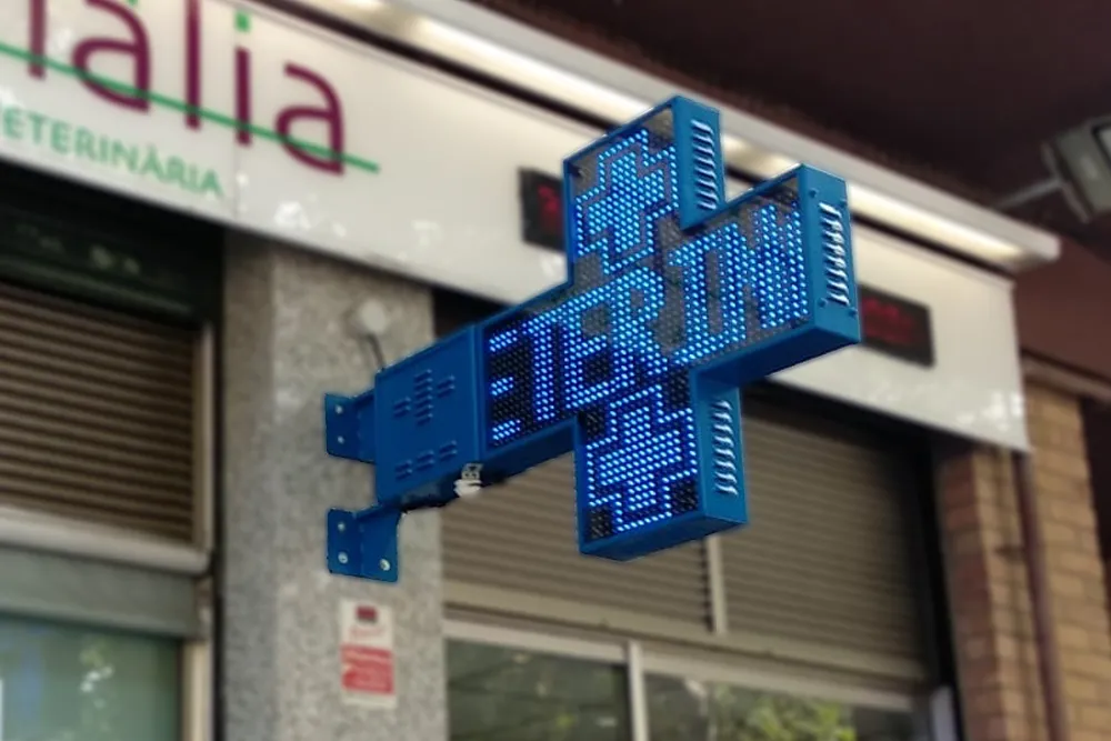 imagen de la cruz de farmacia venus en azul para veterinaria